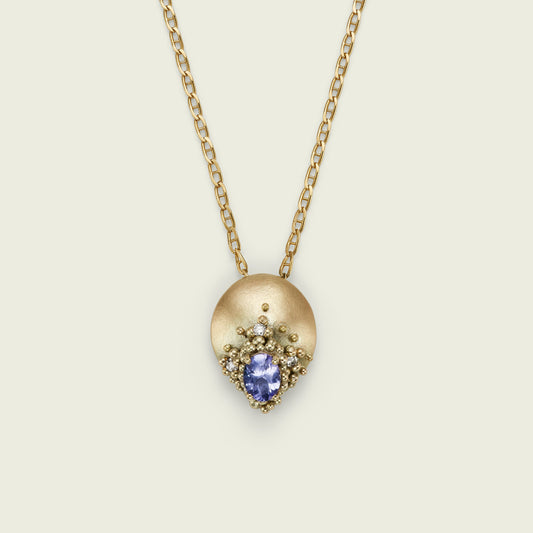 I love the gentle luminosity and soft tones of this bespoke Adorn Pendant, crafted entirely from my client’s own tanzanite, diamonds and 9ct gold. It now hangs from her favourite chain and can be swapped seamlessly with another pendant we transformed, allowing both pieces to be worn with ease and intention.