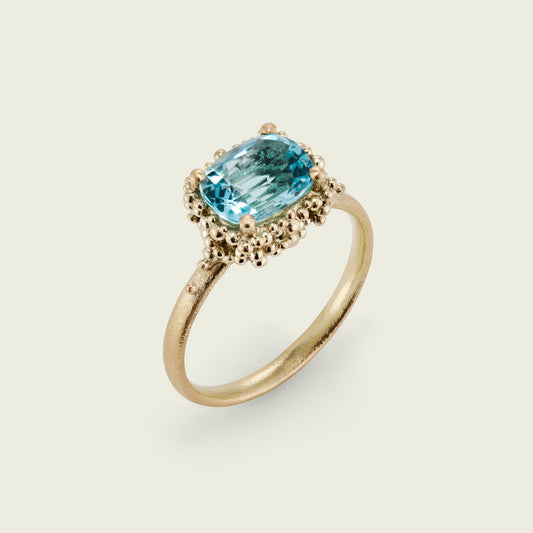 Having broken her engagement ring, I created a design for my client in Cornwall, using her original sentimental materials. The aquamarine, re-orientated and clustered in ultra-fine granulation, was also polished and recut. The ring is now alive with light, sparkle and the colours of the Cornish sea.