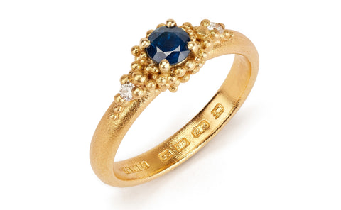 42.  Sapphire cluster ring